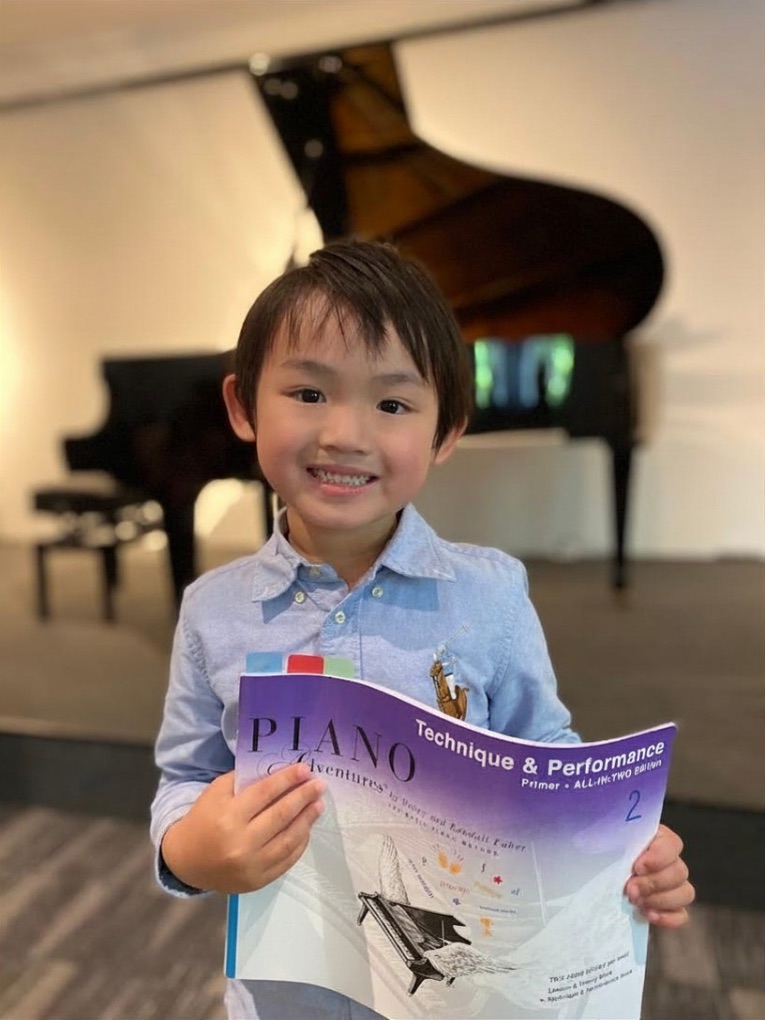Young piano student learning at Avviare Music Academy.